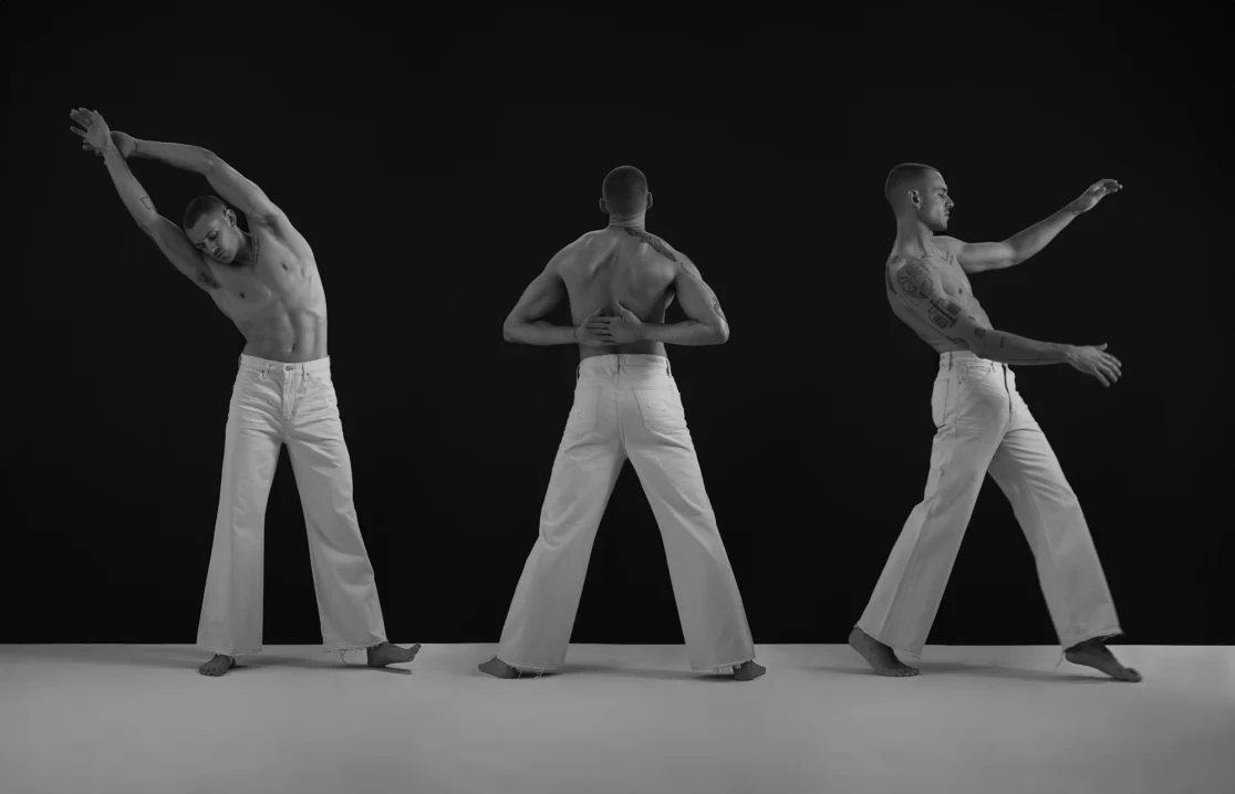 Triple exposure black and white fashion photo of male model in wide-leg white pants performing dance-inspired movement.